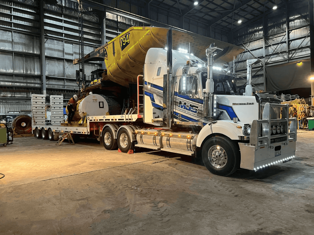 Oversized mining equipment secured for transport by MJS